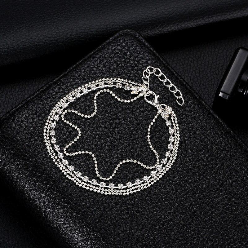 Trendy Four Layered Ball Shinny Crystal Silver – bracelet Online in Pakistan | Hanaya