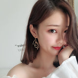 Unique Fashionable Long Face Hanging Irregular Drop Earrings – Earrings Online in Pakistan | Hanaya