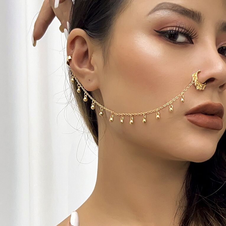 Non-Piercing Clip-On Thin Nose Pin Elegant Nostril Body Jewelry with Chain – Fake Ethnic Piercing Jewelry – Close Up – Nos...