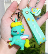 Close-up of plush unicorn keychain with rainbow mane – kawaii bag charm Pakistan – Hanaya