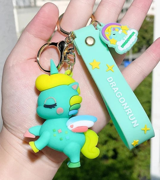 Close-up of plush unicorn keychain with rainbow mane – kawaii bag charm Pakistan – Hanaya