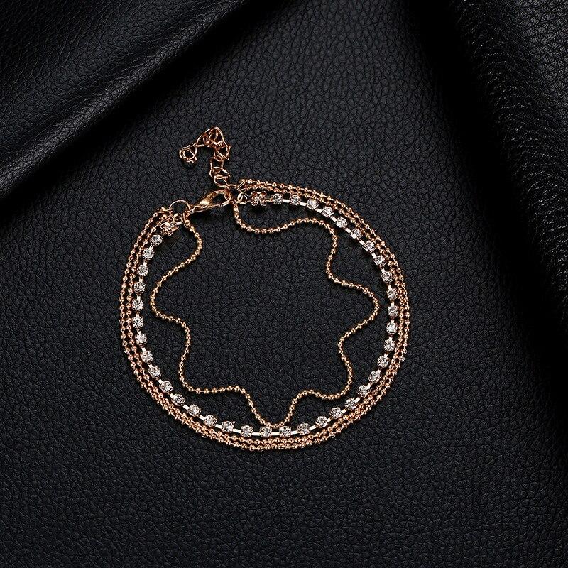 Trendy Four Layered Ball Shinny Crystal Golden – bracelet Online in Pakistan | Hanaya