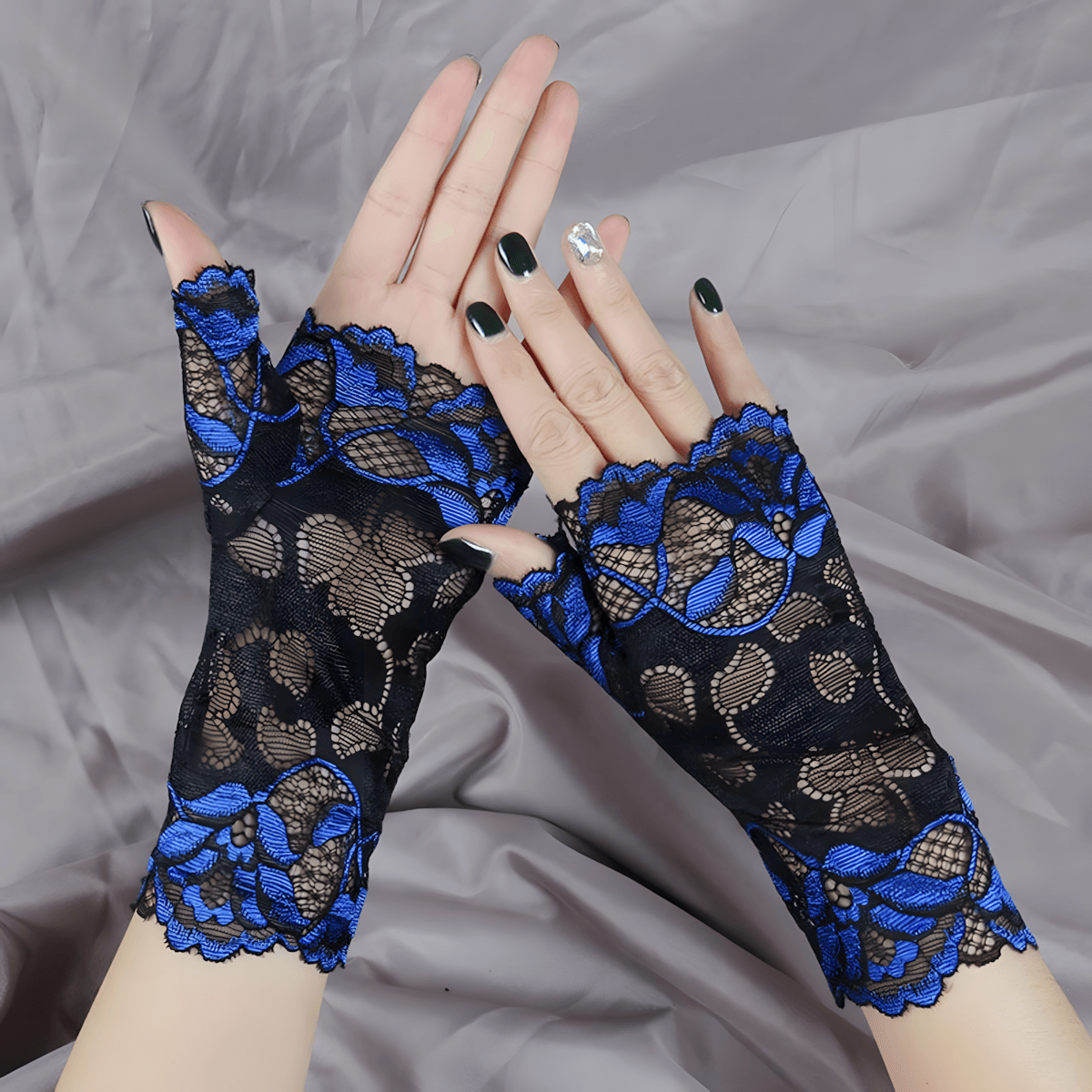 Women's elegant fishnet lace long fingerless gloves, gothic and vintage style accessory.